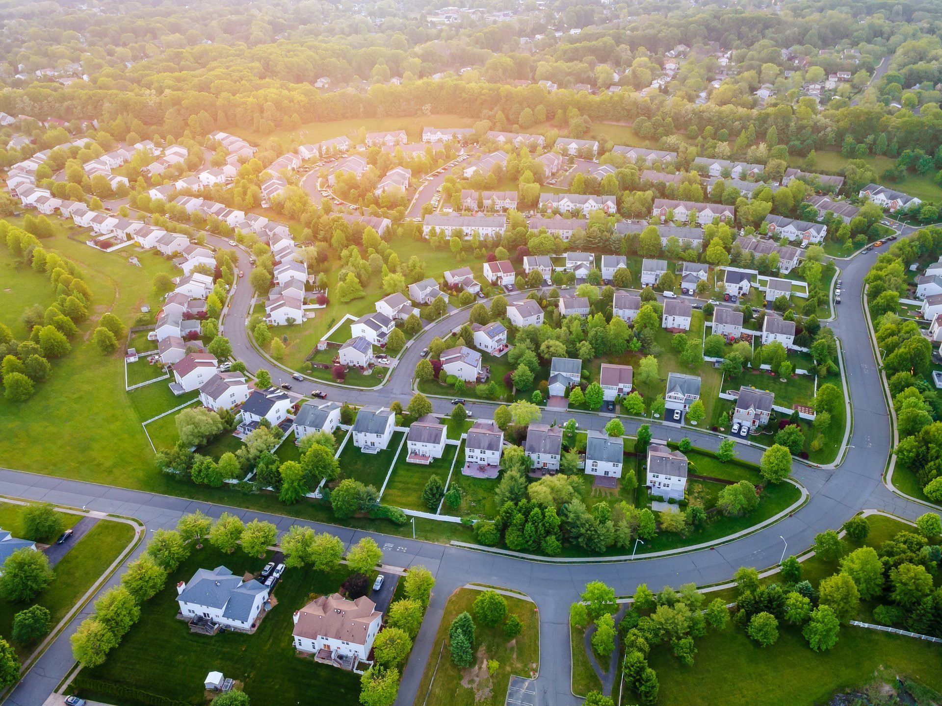 Aerial view of a beautiful suburban neighborhood with residential homes